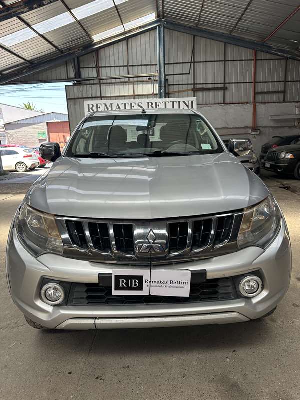 1.- MITSUBISHI, MODELO L200 DAKAR D CAB CRS 4X4 2.4 AUT, PATENTE